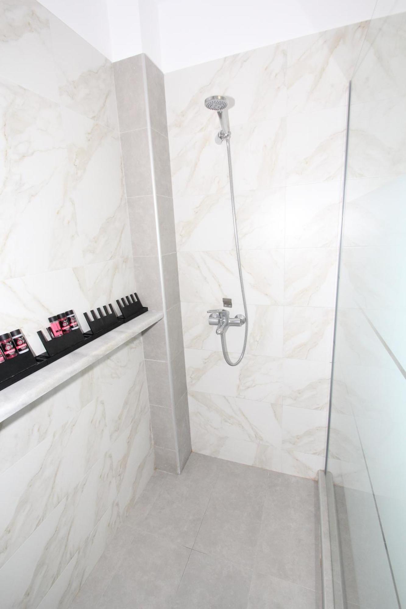 Filoxenia Apartment Артеміда Екстер'єр фото